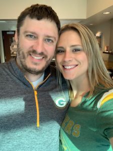 husband & wife at Packer game