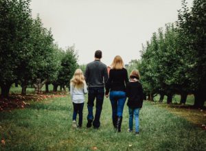 2 children and 2 parents walking in an orchard, would i marry my husband again
