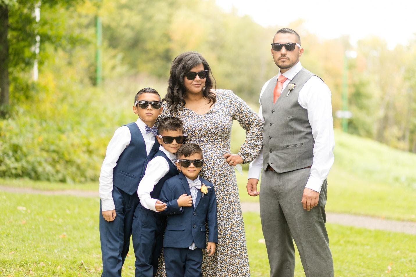 hispanic family wearing sunglasses, cool mom