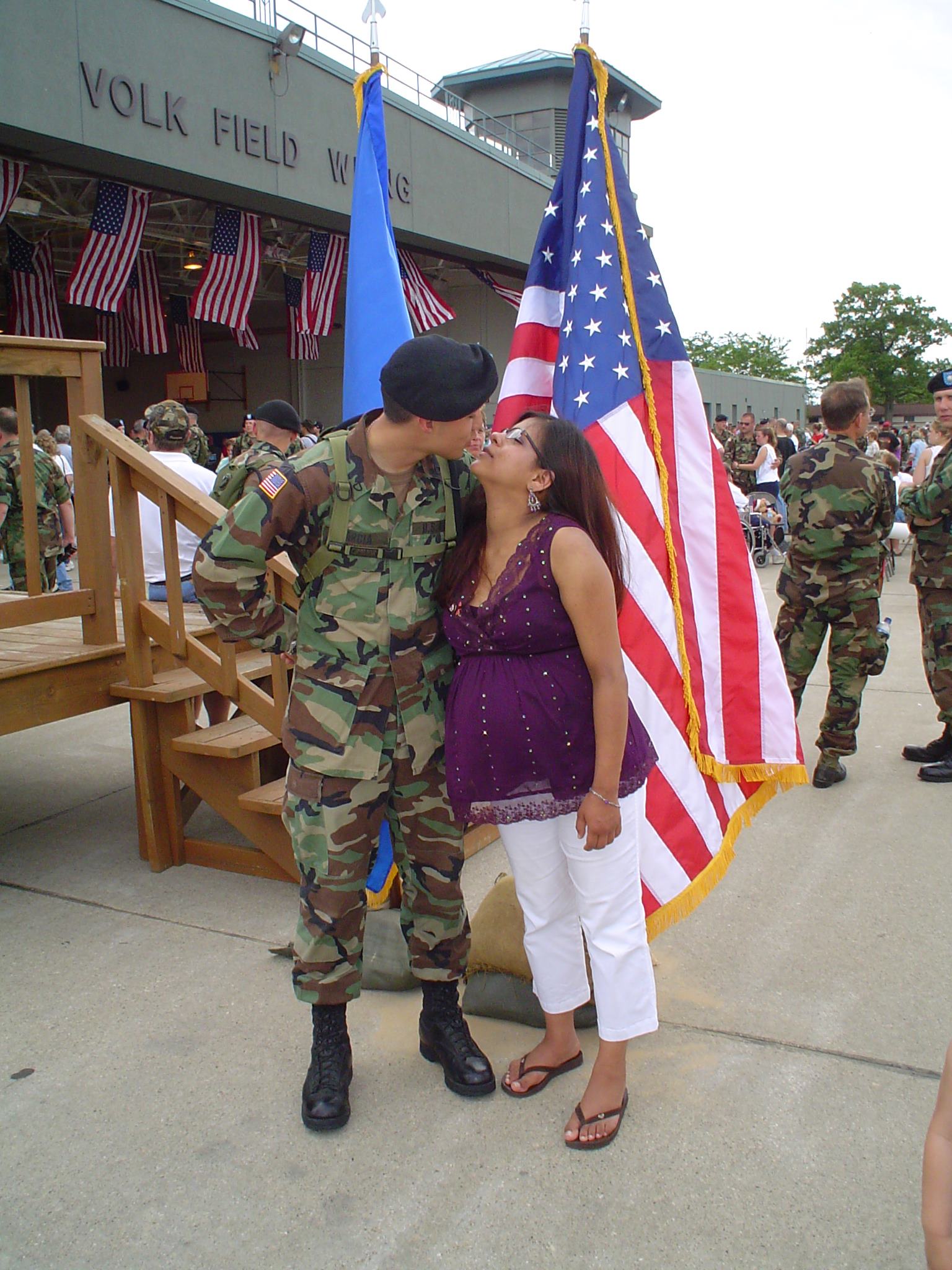 military husband and wife kissing; marriage first