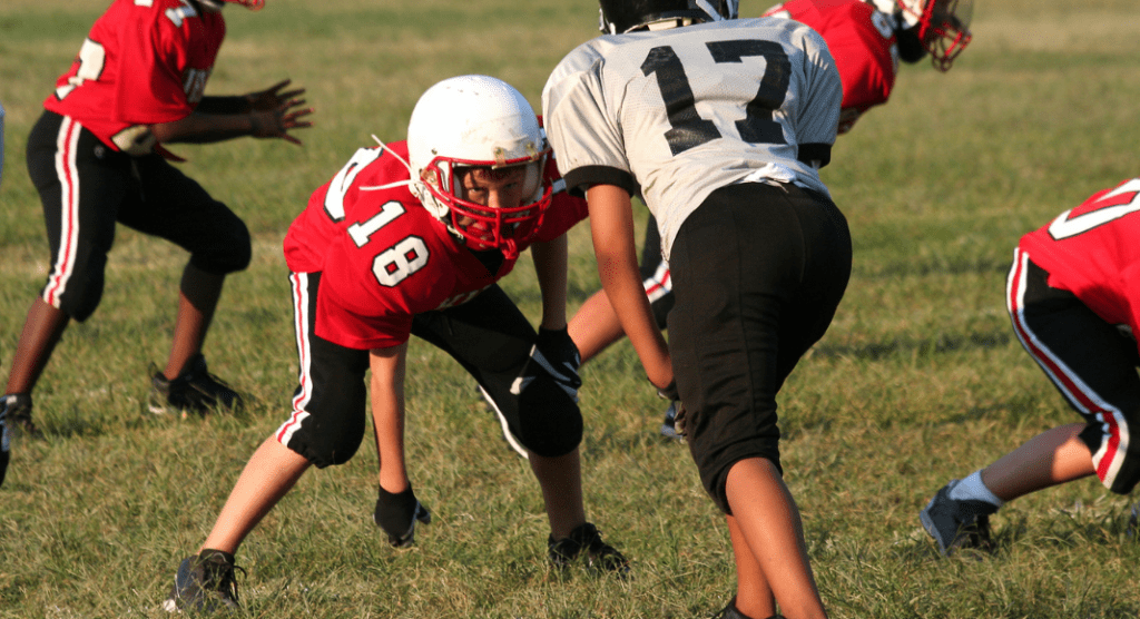 common sports injuries; kids playing football