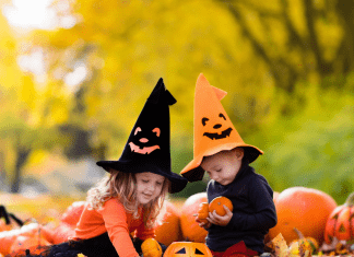 kids playing with pumpkins