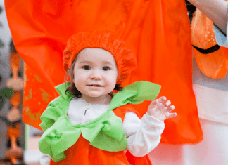 2021 halloween costume contest; girl in pumpkin costume